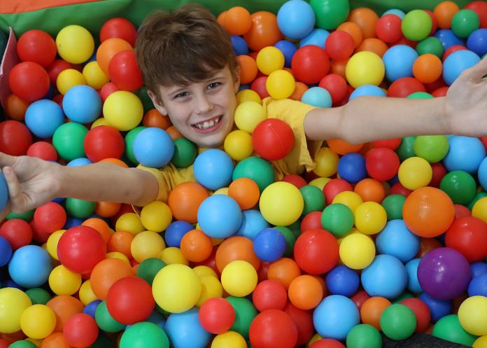 Orbis Group - Summergil house child playing in ball pit